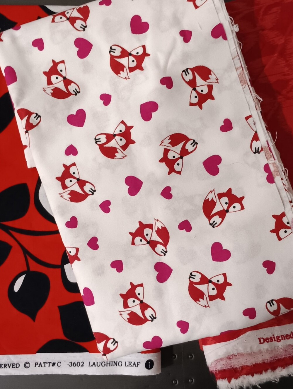 Red cotton print fabrics 7 1/2 yards (approx.)